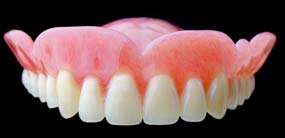 Prótesis dental completa arriba dentadura